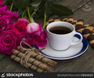 coffee, flowers pink and cookies of two types