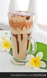 coffee frappe with plumeria