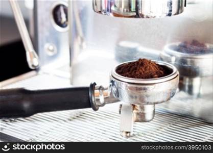 Coffee grind in group with coffee machine, stock photo