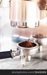 Coffee grind in group with coffee machine with vintage style, stock photo