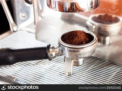 Coffee grind in group with coffee machine with vintage style, stock photo