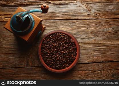 Coffee grinder vintage on wooden old table background