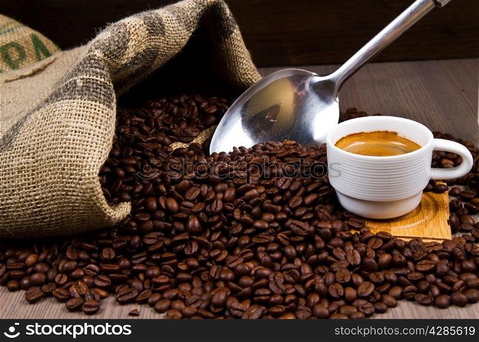 Coffee Grinder with Beans and coffe cup
