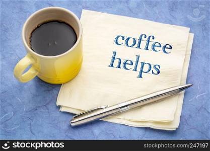 coffee helps - handwriting on a napkin with a cup of espresso coffee