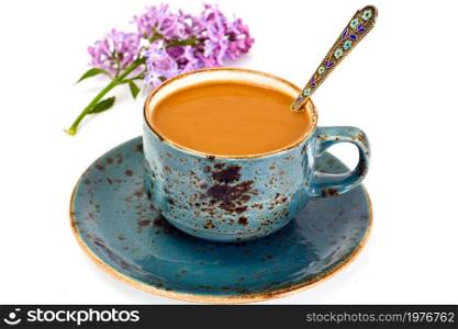 Coffee in a Blue Retro Cup with Flowers. Studio Photo. Coffee in a Blue Retro Cup with Flowers