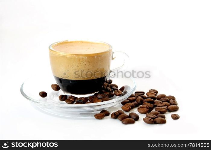 Coffee in a transparent mug on the white background