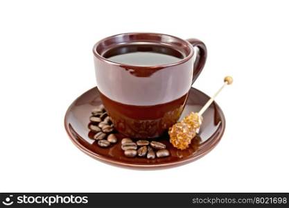 Coffee in brown cup with crystal sugar on a saucer isolated on white background