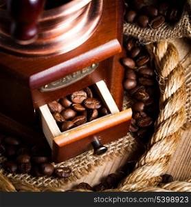 Coffee in grinder and rope still life