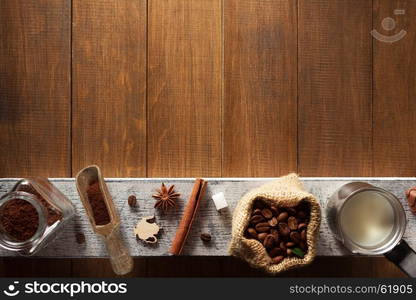 coffee ingredients on wooden background