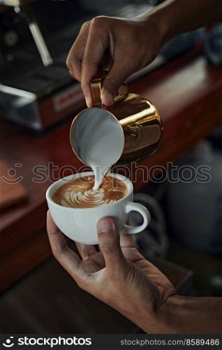 coffee latte art making by barista 
