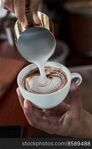 coffee latte art making by barista  
