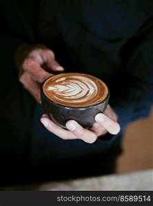 coffee latte art making by barista  . coffee latte art