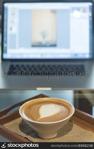 coffee latte art with laptop