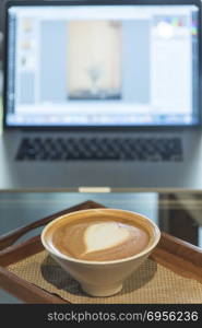 coffee latte art with laptop