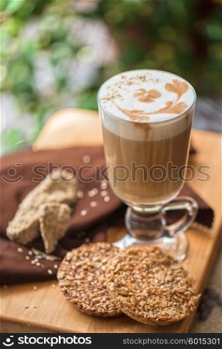 coffee latte cup with cookies. coffee latte cup with cookies closeup