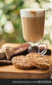 coffee latte cup with cookies. coffee latte cup with cookies closeup