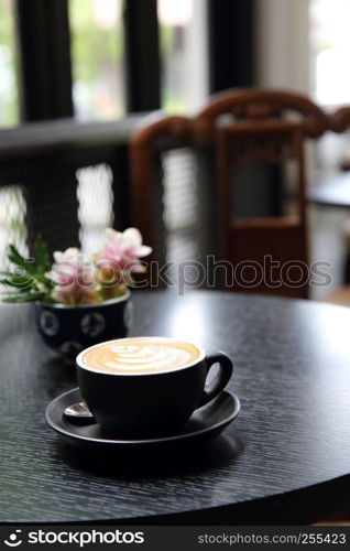 coffee latte on wood background