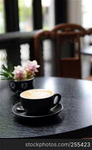 coffee latte on wood background
