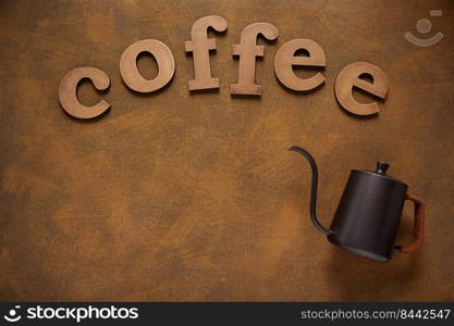 Coffee letters and pot on abstract background texture. Coffee concept