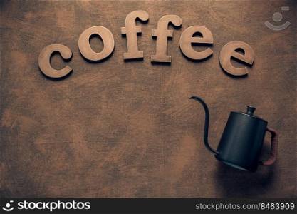 Coffee letters on abstract background texture. Coffee pot