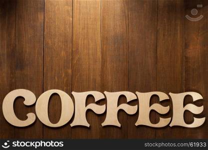 coffee letters on wooden background