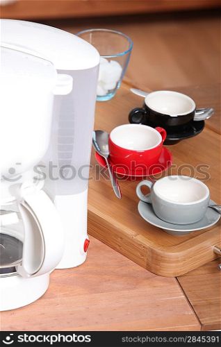 Coffee machine and cups