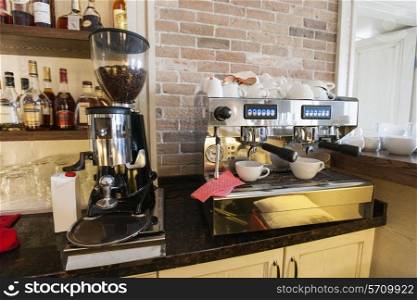 Coffee maker and espresso machine at restaurant counter