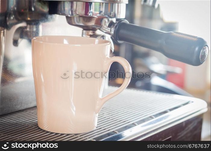 Coffee mug in coffee shop, stock photo