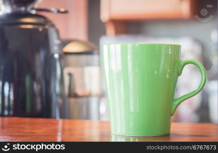 Coffee mug in coffee shop, stock photo