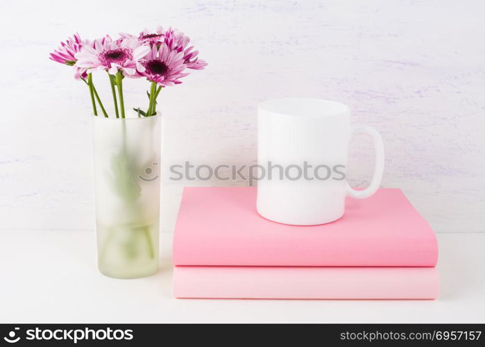Coffee mug mockup with lilac daisy. Coffee mug mockup with lilac daisy. White coffee cup mockup. Empty blank mug mockup with place for design or text