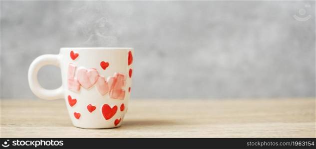 coffee mug on wood table background in the morning, Blank copy space for text. International coffee day, happy Valentine day and daily routine concept