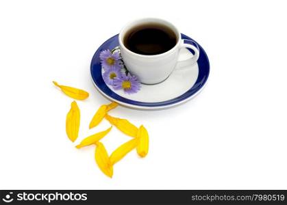 coffee on a saucer, decorated with three blue florets and petals, a subject drinks and flowers