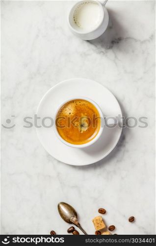 Coffee on white marble background. Minimal flat lay. Coffee on white marble background. Coffee on white marble background