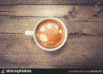 coffee on wood table background with space.