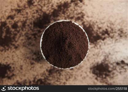 coffee powder on wood background