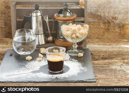 coffee set . cup of black coffee with preparing set on wooden table