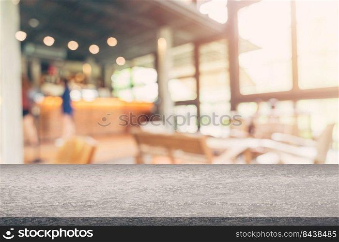Coffee shop blur background with bokeh image .