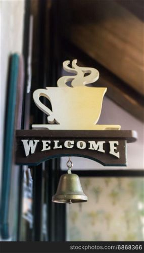 Coffee shop welcome bell vintage style, stock photo
