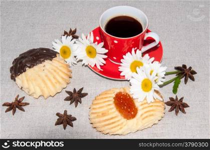 Coffee shortbread cookies and wild flowers camomile