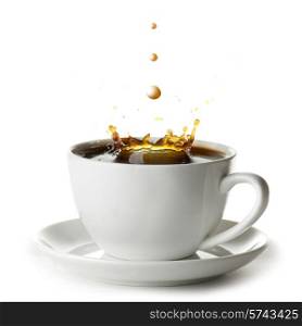 Coffee splash with drops in cup isolated on white background