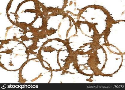 Coffee stains on textile table-cloth isolated on the white background