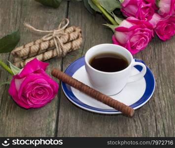 coffee still life, cookies in the form of sticks and a rose on each side, a subject food and drinks