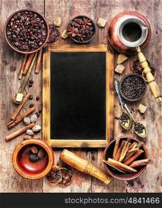Coffee still life with beans,cinnamon,anise and brown sugar.Copy space