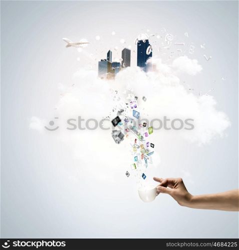 Coffee time. Close up of businessman holding white cup with icons flying out
