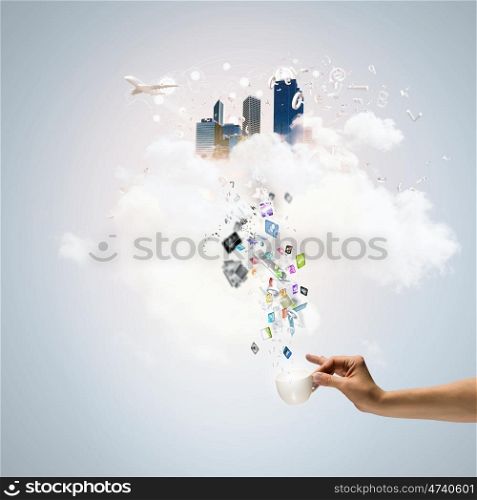 Coffee time. Close up of businessman holding white cup with icons flying out