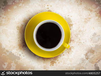 Coffee time. Close up of coffee cup on stone surface