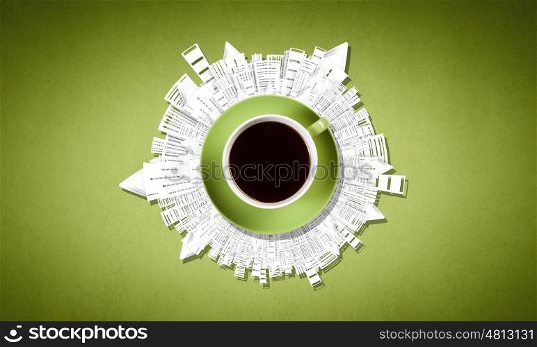 Coffee time. Top view of cup of coffee on color background