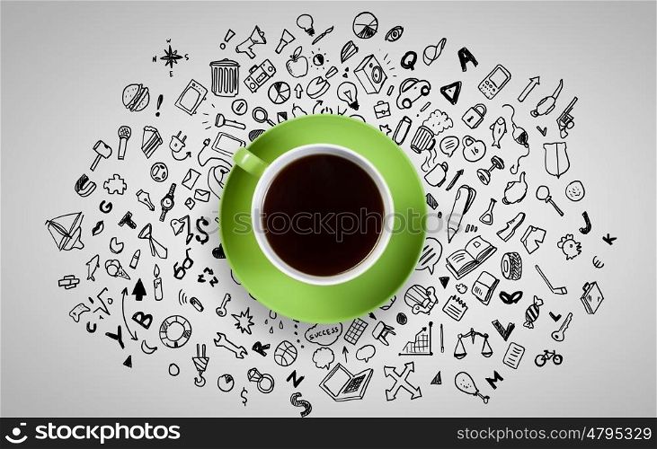 Coffee time. Top view of cup of coffee on white background