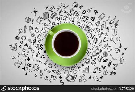 Coffee time. Top view of cup of coffee on white background