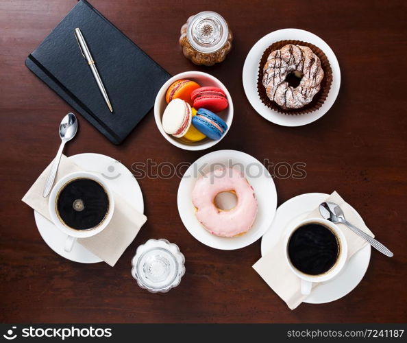 Coffee with dessert on the table,top view.. Coffee with dessert.